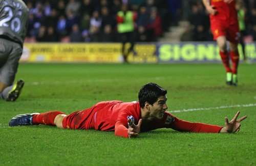 Liverpool (4) Wigan (0): Suarez Hat-Trick Demolishes Latics