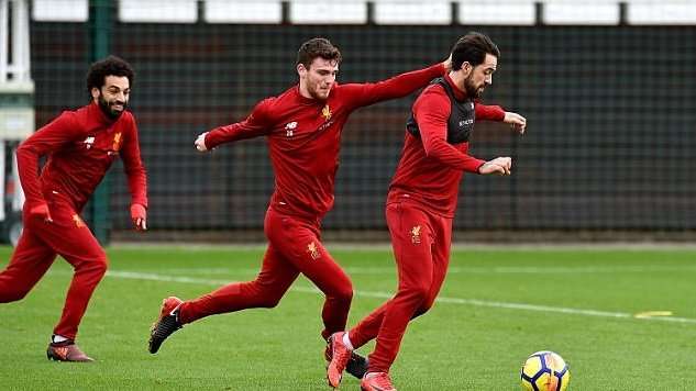 Salah is “Working Hard” to Win Trophies, Robertson Aiming to Meet “Sky High” Standards