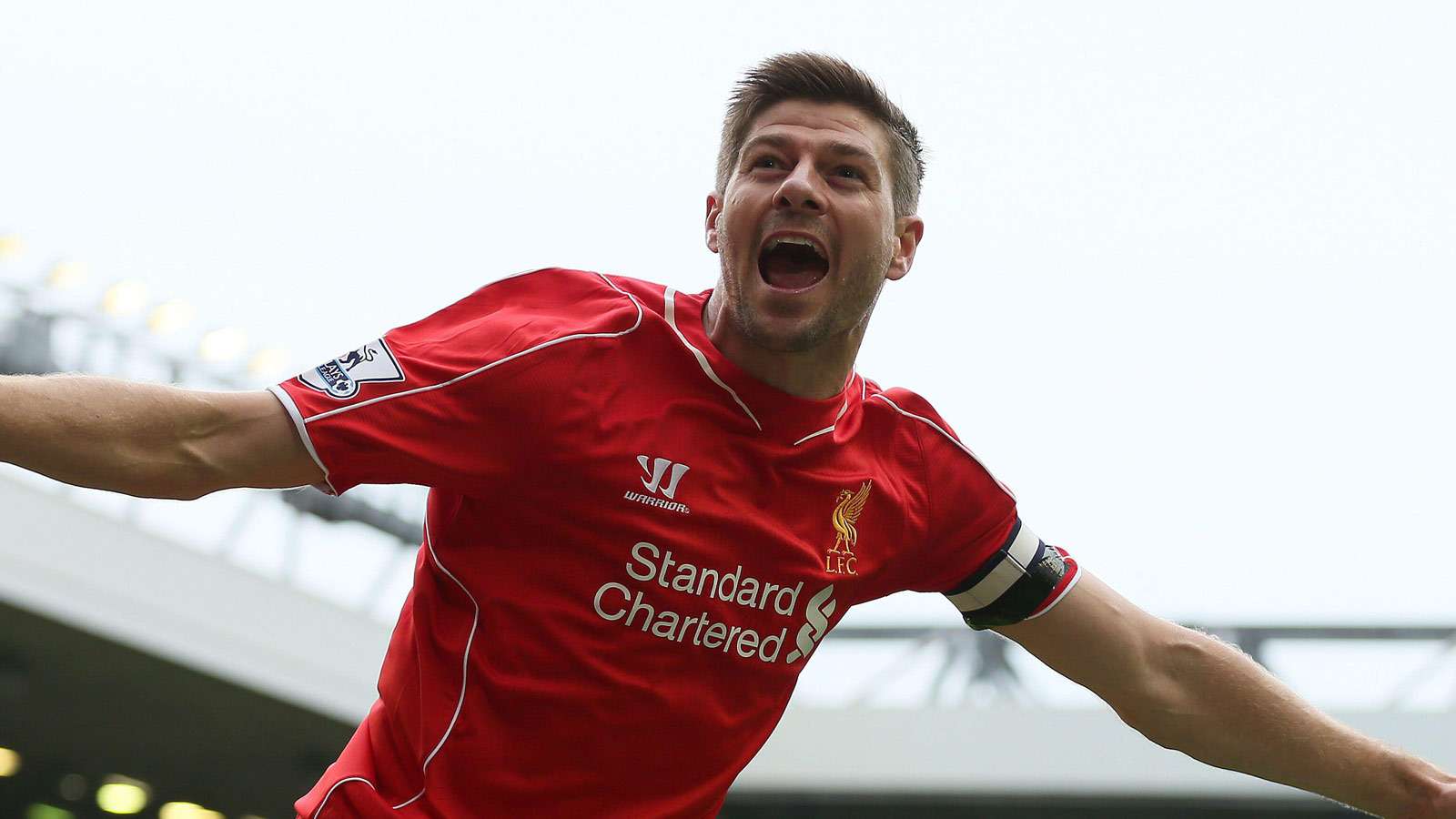 Steven Gerrard celebrates against QPR at Anfield in May 2015