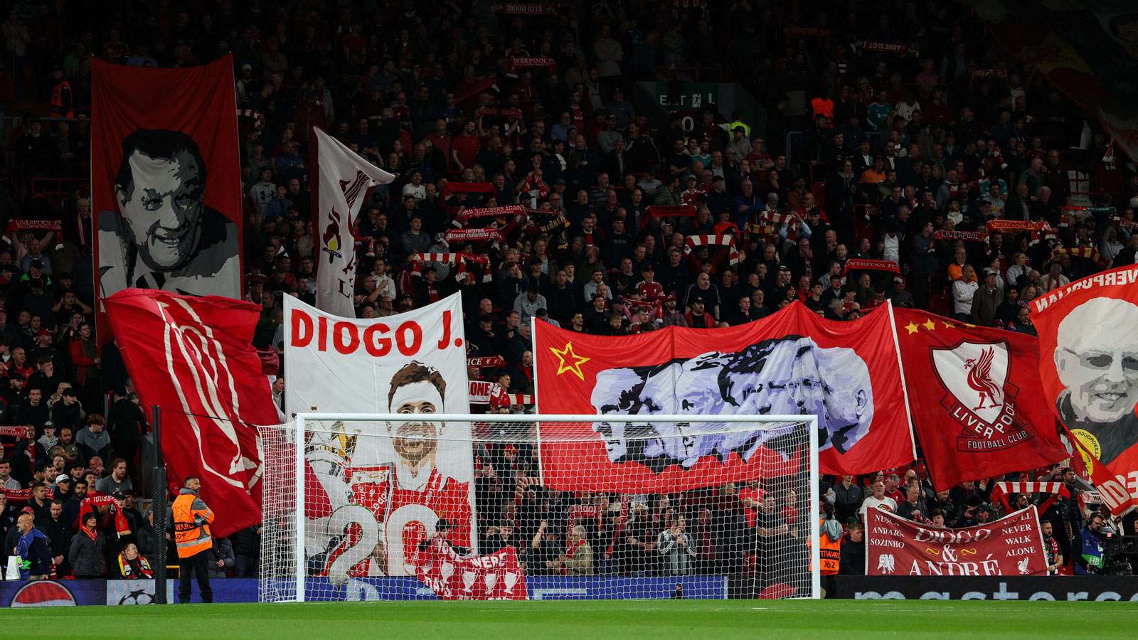 Liverpool fans display flags at Anfield