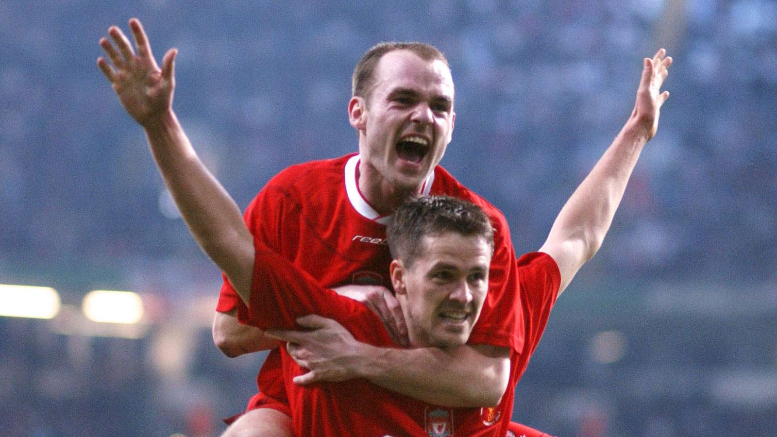 Danny Murphy and Michael Owen celebrate
